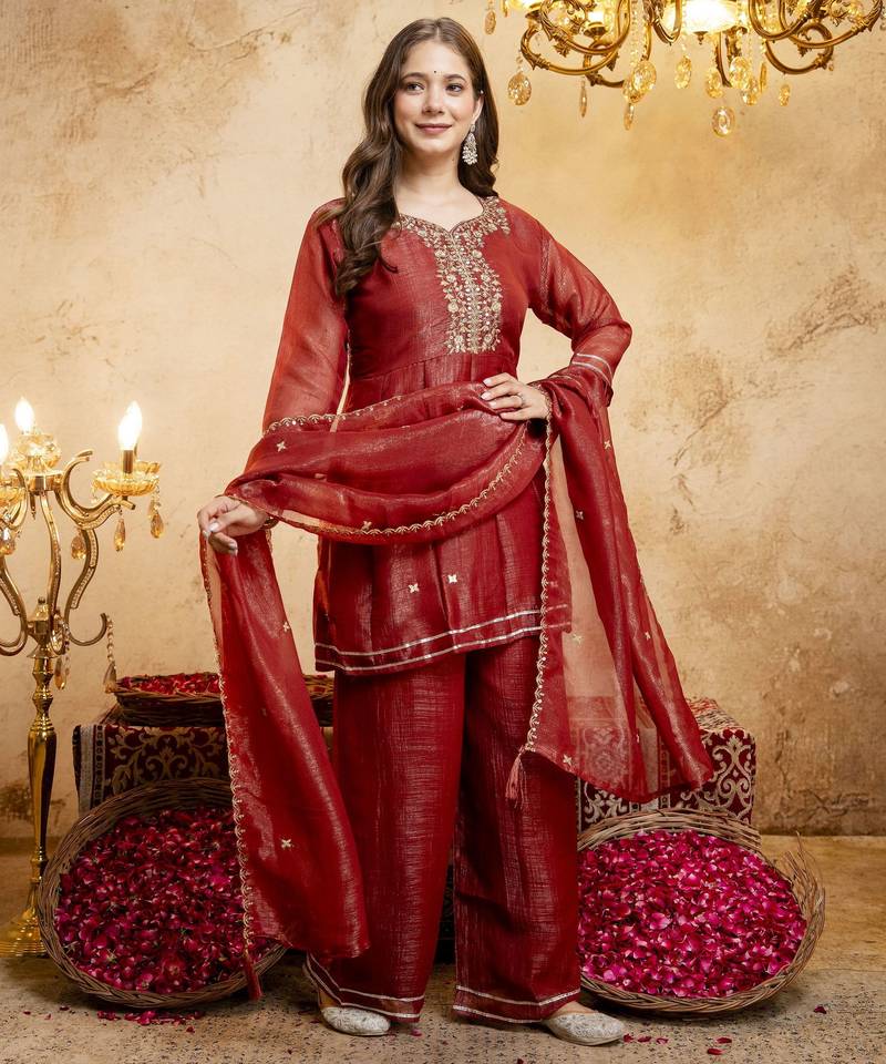 Rust color smart crunchy fabric designer graceful partywear suit for trendy girlie looks