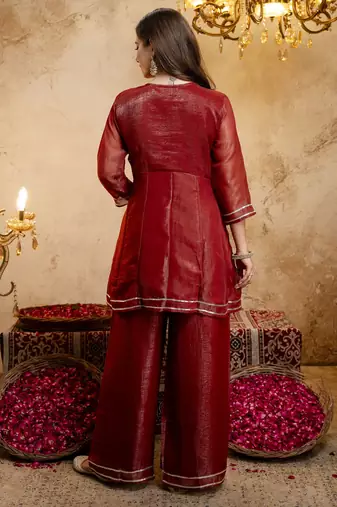 Rust color smart crunchy fabric designer graceful partywear suit for trendy girlie looks