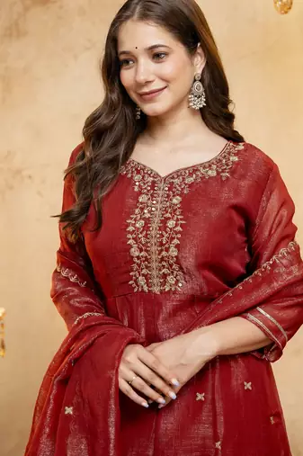 Rust color smart crunchy fabric designer graceful partywear suit for trendy girlie looks