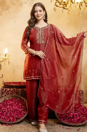 Rust color smart crunchy fabric designer graceful partywear suit for trendy girlie looks