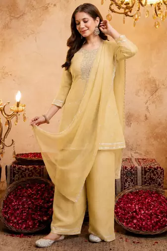 Yellow color smart crunchy fabric designer graceful partywear suit for trendy girlie looks