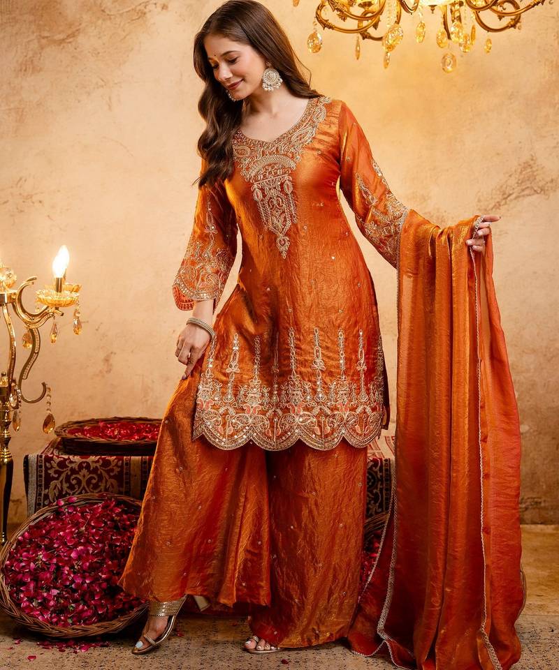 Orange color smart fendy fabric designer graceful partywear suit for trendy girlie looks