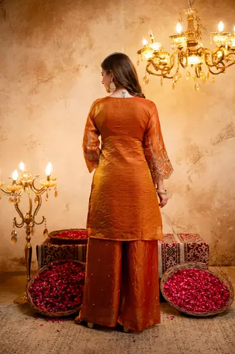 Orange color smart fendy fabric designer graceful partywear suit for trendy girlie looks