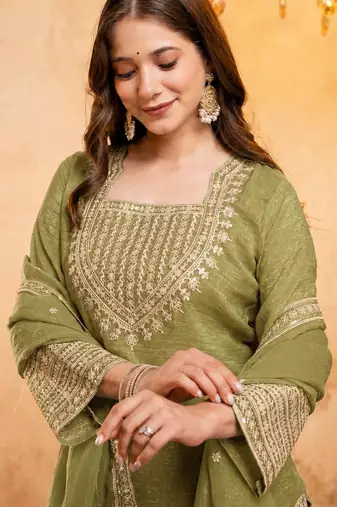 Mahendi color smart crunchy fabric designer graceful partywear suit for trendy girlie looks