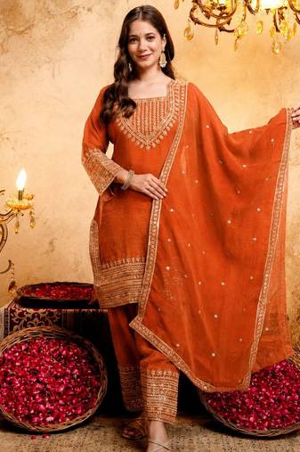 Orange color smart crunchy fabric designer graceful partywear suit for trendy girlie looks