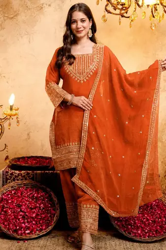 Orange color smart crunchy fabric designer graceful partywear suit for trendy girlie looks