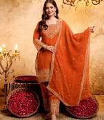 Orange color smart crunchy fabric designer graceful partywear suit for trendy girlie looks