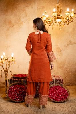 Orange color smart crunchy fabric designer graceful partywear suit for trendy girlie looks 2