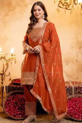 Orange color smart crunchy fabric designer graceful partywear suit for trendy girlie looks