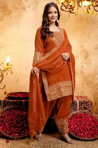 Orange color smart crunchy fabric designer graceful partywear suit for trendy girlie looks