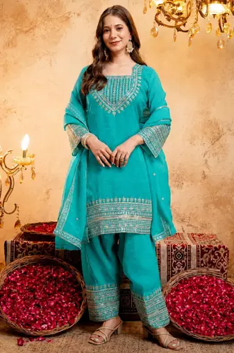 Firozi color smart crunchy fabric designer graceful partywear suit for trendy girlie looks