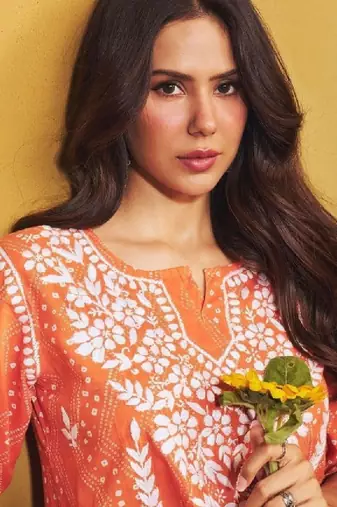 Sonam orange mulmul chikankari kurta