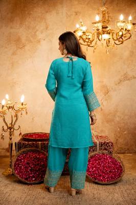 Firozi color smart crunchy fabric designer graceful partywear suit for trendy girlie looks 2
