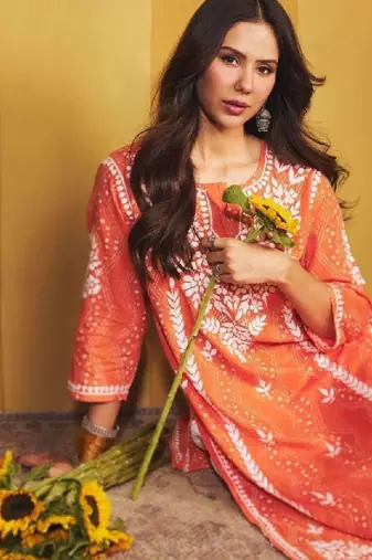 Sonam orange mulmul chikankari kurta
