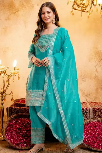 Firozi color smart crunchy fabric designer graceful partywear suit for trendy girlie looks