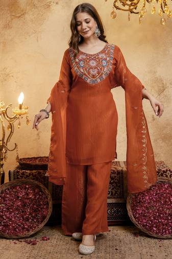 Orange color smart crunchy fabric designer graceful partywear suit for trendy girlie looks