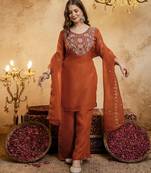 Orange color smart crunchy fabric designer graceful partywear suit for trendy girlie looks