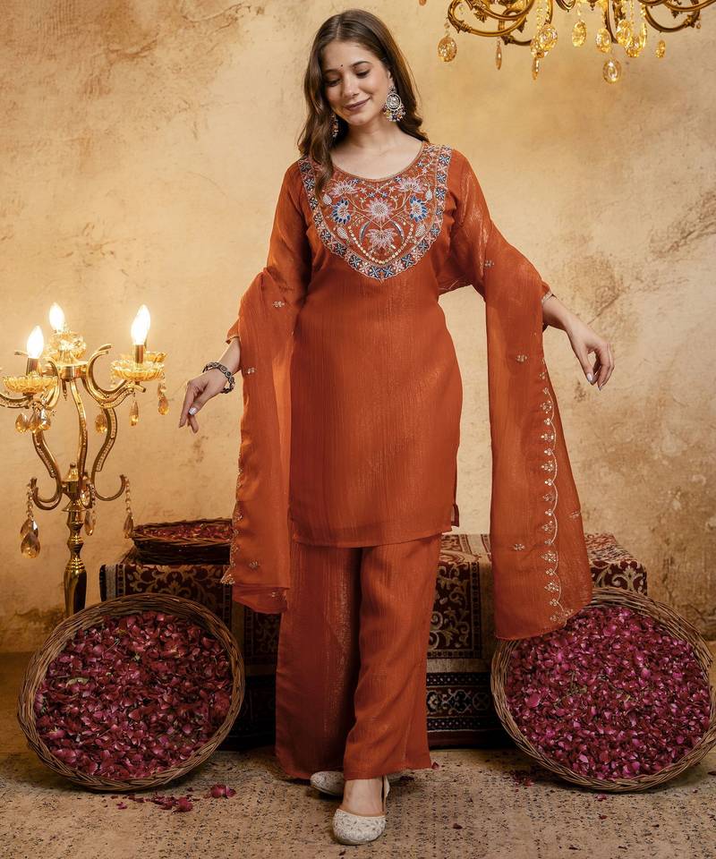 Orange color smart crunchy fabric designer graceful partywear suit for trendy girlie looks