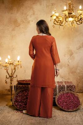 Orange color smart crunchy fabric designer graceful partywear suit for trendy girlie looks 2