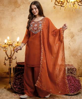 Orange color smart crunchy fabric designer graceful partywear suit for trendy girlie looks 4