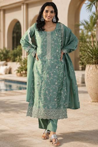 Green color smart vichitra fabric designer graceful partywear suit for trendy girlie looks