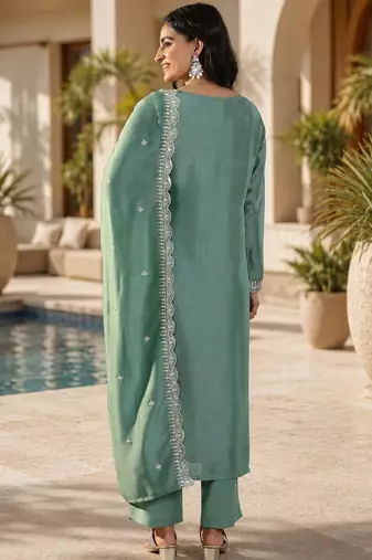 Green color smart vichitra fabric designer graceful partywear suit for trendy girlie looks