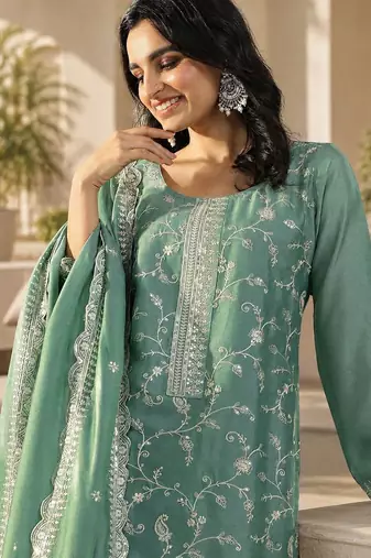 Green color smart vichitra fabric designer graceful partywear suit for trendy girlie looks