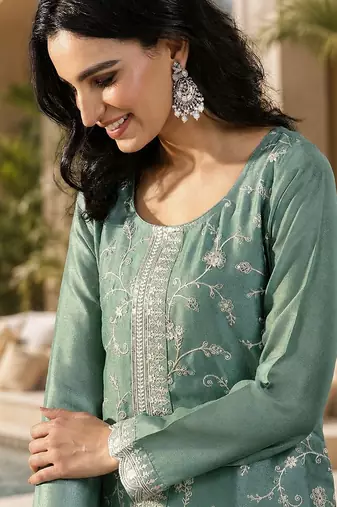 Green color smart vichitra fabric designer graceful partywear suit for trendy girlie looks