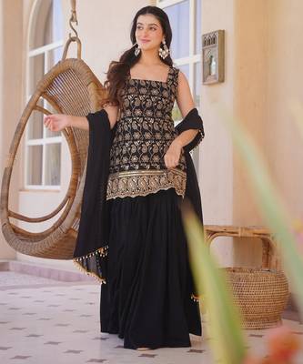 Black color smart and girlie silk blend fabric fancy festive attire for girls 1
