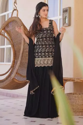 Black color smart and girlie silk blend fabric fancy festive attire for girls