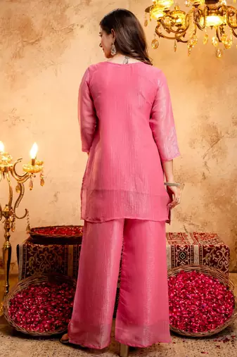 Pink color smart and girlie crunchy fabric fancy festive attire for girls
