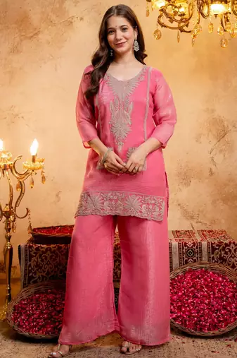 Pink color smart and girlie crunchy fabric fancy festive attire for girls