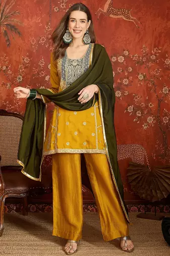 Mustard color ethnic vichitra silk fabric heavy embroidered partywear suit