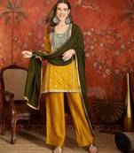 Mustard color ethnic vichitra silk fabric heavy embroidered partywear suit