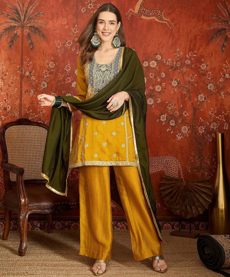 Mustard color ethnic vichitra silk fabric heavy embroidered partywear suit