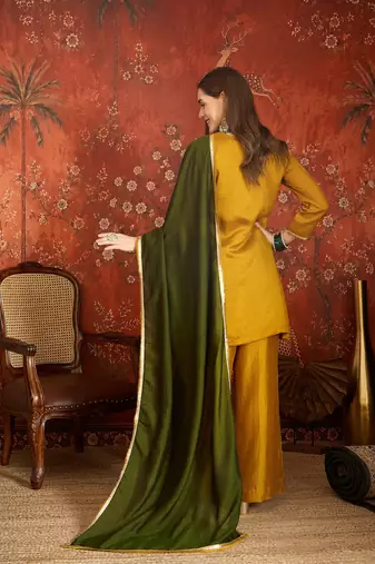 Mustard color ethnic vichitra silk fabric heavy embroidered partywear suit
