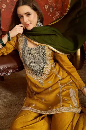 Mustard color ethnic vichitra silk fabric heavy embroidered partywear suit