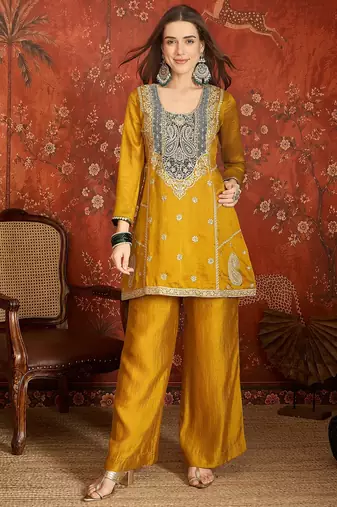 Mustard color ethnic vichitra silk fabric heavy embroidered partywear suit
