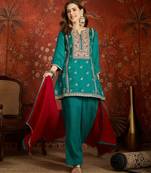 Blue color ethnic vichitra silk fabric heavy embroidered partywear suit