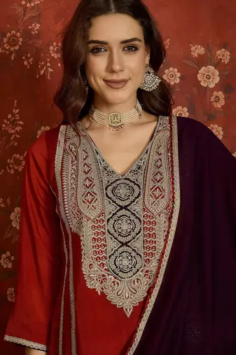 Rust color ethnic vichitra silk fabric heavy embroidered partywear suit