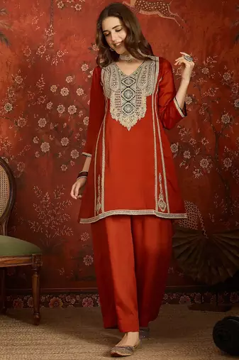 Rust color ethnic vichitra silk fabric heavy embroidered partywear suit