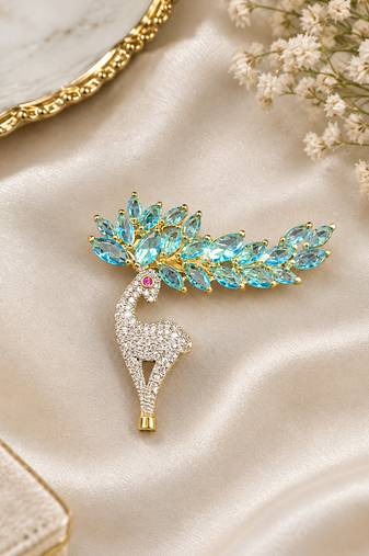 Elegant swan bird brooch with blue crystal leaf design & rhinestone detailing