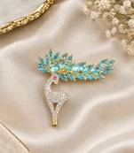 Elegant swan bird brooch with blue crystal leaf design & rhinestone detailing
