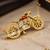 Elegant bicycle brooch with crystal embellishments & red enamel detailing