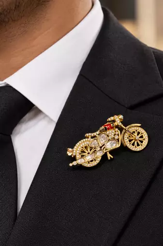 Elegant bicycle brooch with crystal embellishments & red enamel detailing