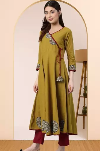 Women mustard yellow floral printed angrakha anarkali kurta with tassel tie-up