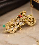 Elegant bicycle brooch with green crystal, clear stones & red enamel detailing