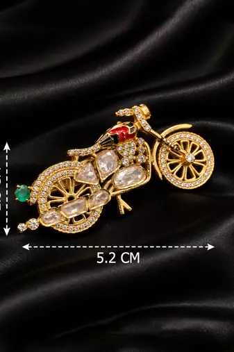 Elegant bicycle brooch with green crystal, clear stones & red enamel detailing