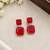 Elegant red square stone drop earrings with silver-tone setting     statement party wear earrings