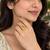 Elegant golden yellow gemstone statement ring with clear stone border